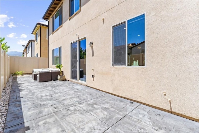 2825 Villa Catalonia Ct, Corona, CA 92881 - fenced backyard featuring a patio area and an outdoor living space