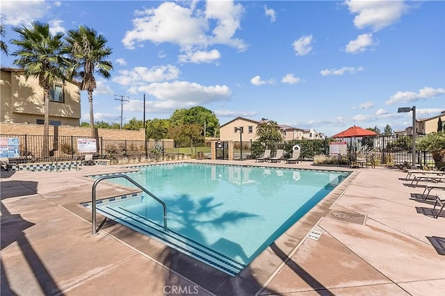 2825 Villa Catalonia Ct, Corona, CA 92881 - community pool with a patio area