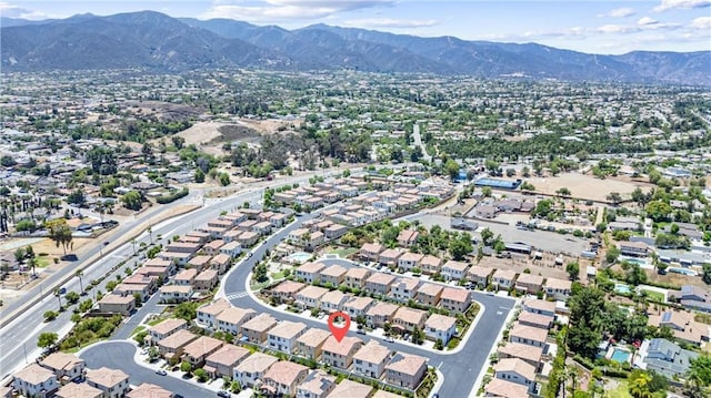 2825 Villa Catalonia Ct, Corona, CA 92881 - aerial view of property's location featuring a mountainous background and nearby suburban area