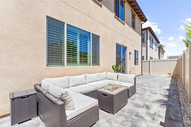 2825 Villa Catalonia Ct, Corona, CA 92881 - fenced backyard with an outdoor living space with a fire pit and a patio