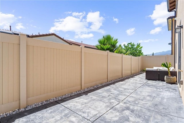 2825 Villa Catalonia Ct, Corona, CA 92881 - fenced backyard with a patio area