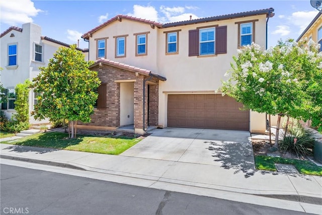 2825 Villa Catalonia Ct, Corona, CA 92881 - mediterranean / spanish house with a tiled roof, an attached garage, brick siding, concrete driveway, and stucco siding