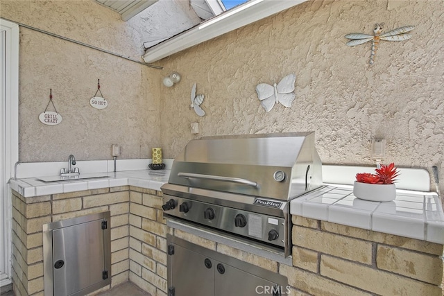 3110 N Greenbrier Rd, Long Beach, CA 90808 - view of patio with a sink and exterior kitchen