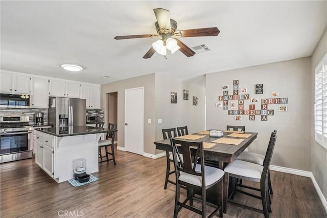 1519 Bluejay Way, Hemet, CA 92545 - dining room with ceiling fan and dark wood-type flooring