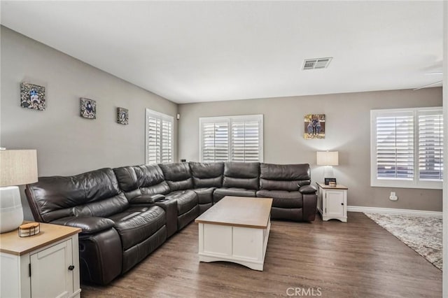 1519 Bluejay Way, Hemet, CA 92545 - living area with healthy amount of natural light and dark wood-style flooring