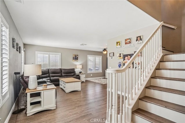 1519 Bluejay Way, Hemet, CA 92545 - living room with wood finished floors, stairs, and ceiling fan