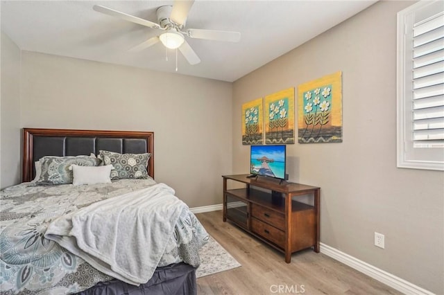1519 Bluejay Way, Hemet, CA 92545 - bedroom with wood finished floors and a ceiling fan
