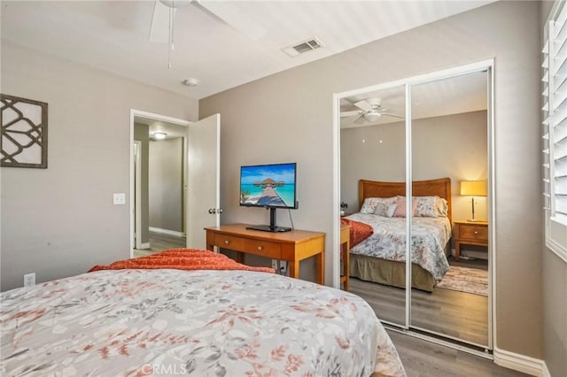 1519 Bluejay Way, Hemet, CA 92545 - bedroom featuring a closet, wood finished floors, and ceiling fan