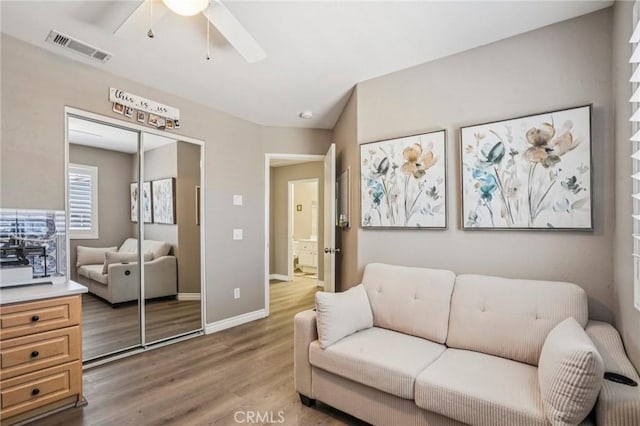 1519 Bluejay Way, Hemet, CA 92545 - living area featuring wood finished floors and ceiling fan