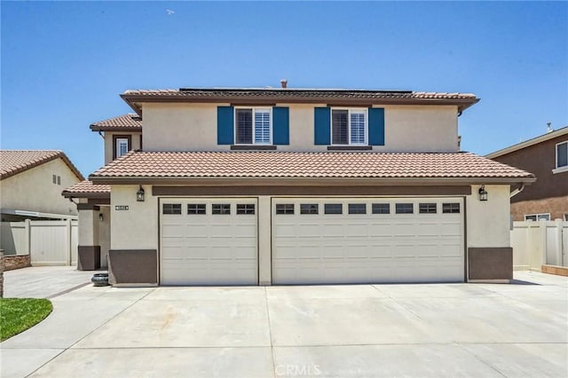 1519 Bluejay Way, Hemet, CA 92545 - mediterranean / spanish-style home featuring driveway, an attached garage, and stucco siding