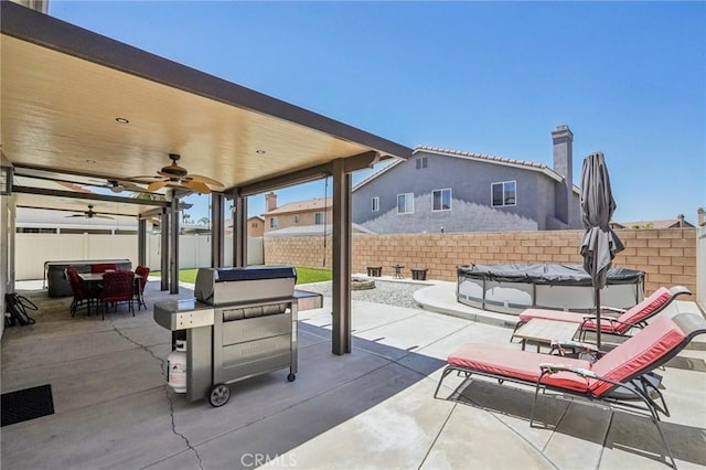 1519 Bluejay Way, Hemet, CA 92545 - fenced backyard featuring ceiling fan, area for grilling, outdoor dining space, and a patio