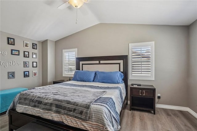 1519 Bluejay Way, Hemet, CA 92545 - bedroom featuring wood finished floors, lofted ceiling, and a ceiling fan