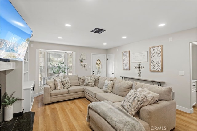 1443 E Devonshire Ave, Hemet, CA 92544 - living room featuring recessed lighting and light wood-type flooring