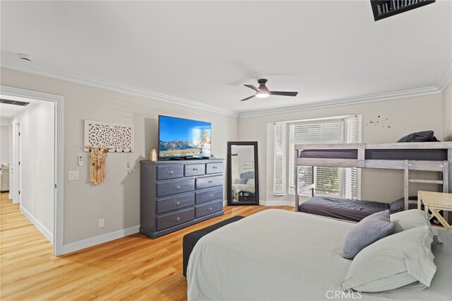 1443 E Devonshire Ave, Hemet, CA 92544 - bedroom featuring ornamental molding, light wood-style flooring, and a ceiling fan