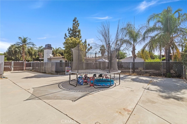 1443 E Devonshire Ave, Hemet, CA 92544 - view of patio / terrace with a trampoline