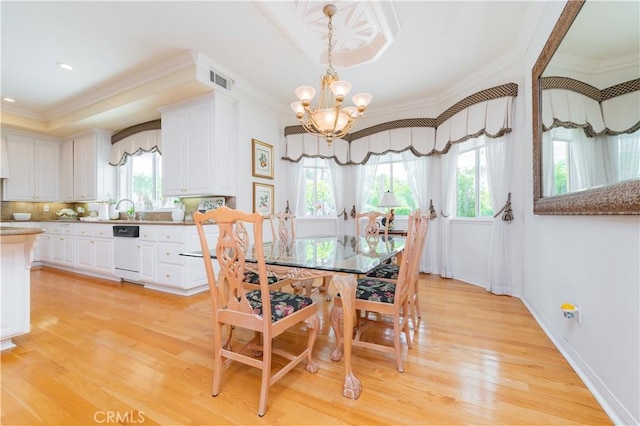 2809 Oak Knoll Dr, Diamond Bar, CA 91765 - dining space featuring a chandelier, crown molding, and light wood-style flooring