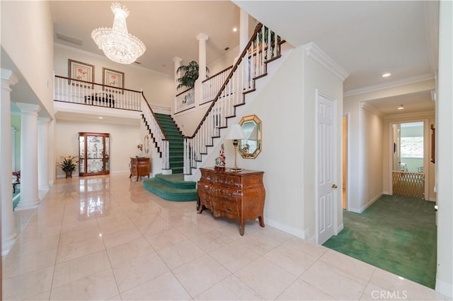 2809 Oak Knoll Dr, Diamond Bar, CA 91765 - entryway with decorative columns, stairs, a chandelier, ornamental molding, and recessed lighting