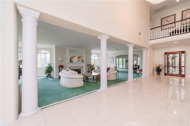 2809 Oak Knoll Dr, Diamond Bar, CA 91765 - carpeted living room featuring a fireplace, ornate columns, crown molding, and a high ceiling