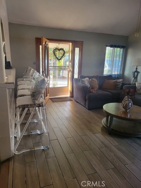 1140 W Cubbon St, Santa Ana, CA 92703 - living area with plenty of natural light and wood finished floors