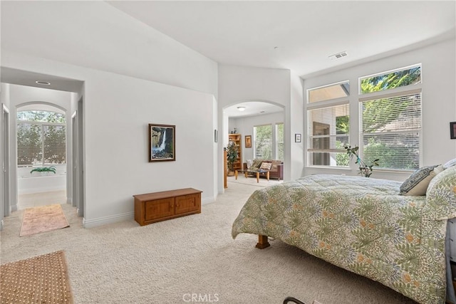 12703 Paso Verde Ct, Atascadero, CA 93422 - bedroom with light colored carpet and arched walkways