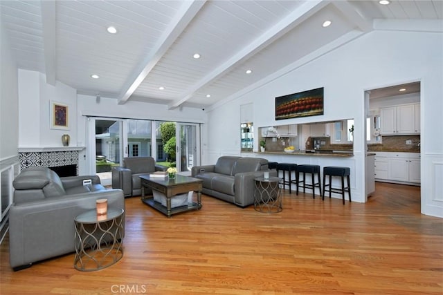 4161 Dixie Canyon Ave, Sherman Oaks, CA 91423 - living area featuring light wood-type flooring, beamed ceiling, recessed lighting, and high vaulted ceiling