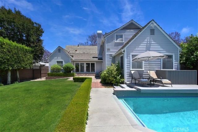 4161 Dixie Canyon Ave, Sherman Oaks, CA 91423 - back of property with a patio and a chimney