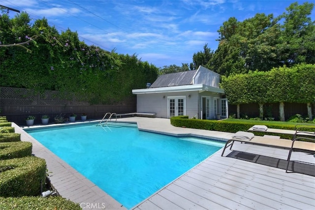 4161 Dixie Canyon Ave, Sherman Oaks, CA 91423 - view of pool featuring a fenced backyard, french doors, an outbuilding, a storage structure, and a patio
