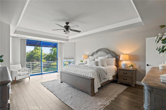 5 Catalina Point Rd, Chico, CA 95928 - bedroom featuring a raised ceiling, access to exterior, wood finished floors, a ceiling fan, and ornamental molding
