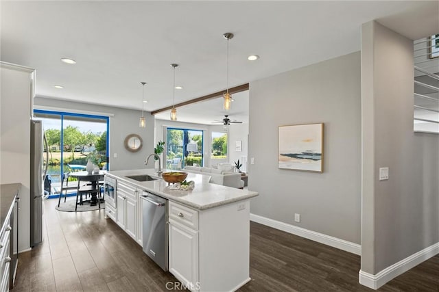 5 Catalina Point Rd, Chico, CA 95928 - kitchen featuring appliances with stainless steel finishes, dark wood finished floors, white cabinets, a kitchen island with sink, and recessed lighting