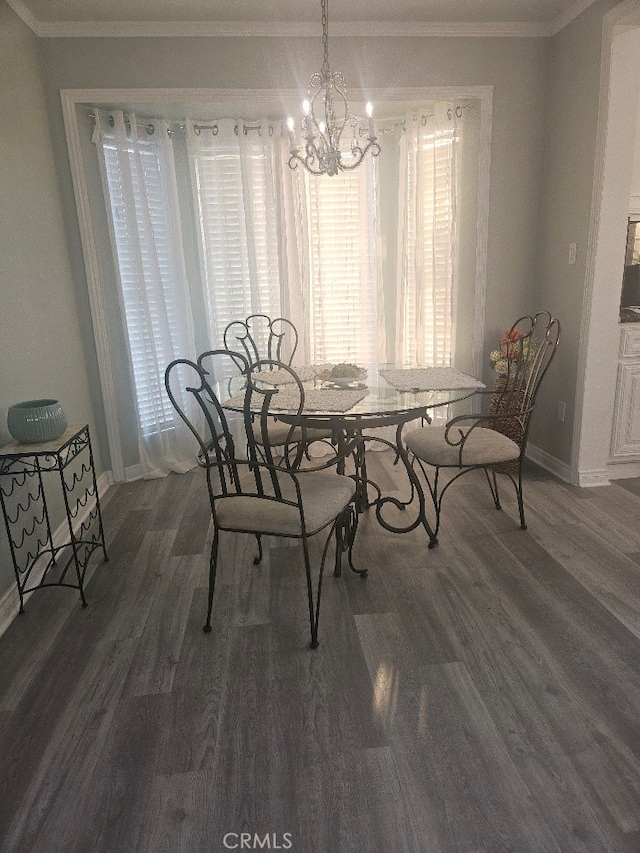 8686 San Juan Ave, South Gate, CA 90280 - dining space with wood finished floors, ornamental molding, and a chandelier