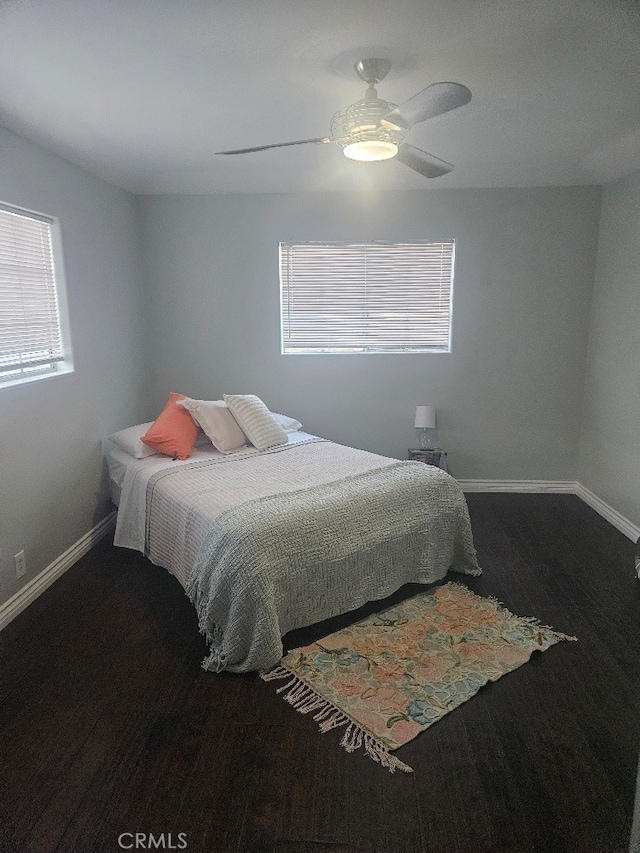 8686 San Juan Ave, South Gate, CA 90280 - bedroom featuring baseboards and a ceiling fan