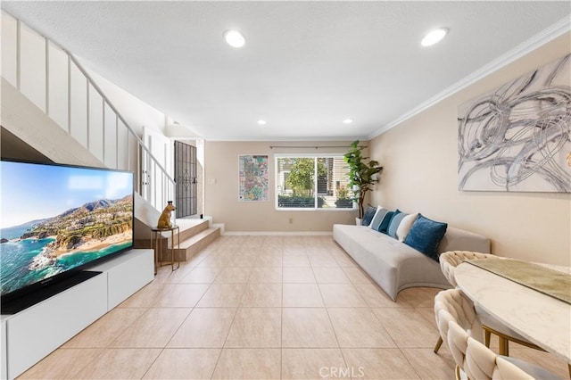 54 Kazan St Unit 27, Irvine, CA 92604 - living area with crown molding, recessed lighting, light tile patterned flooring, and stairs