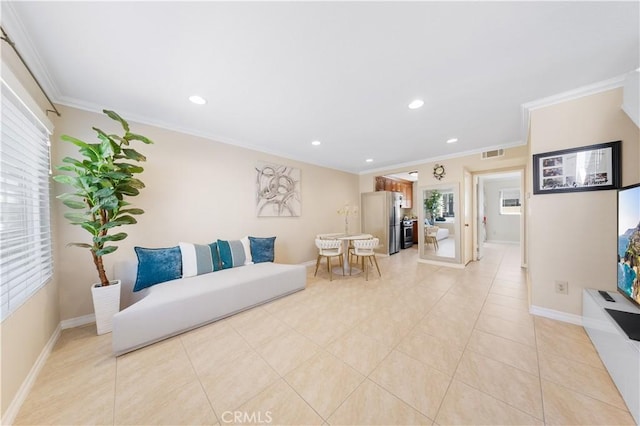 54 Kazan St Unit 27, Irvine, CA 92604 - sitting room featuring ornamental molding, healthy amount of natural light, recessed lighting, and light tile patterned floors