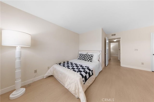 54 Kazan St Unit 27, Irvine, CA 92604 - bedroom featuring light wood-style floors