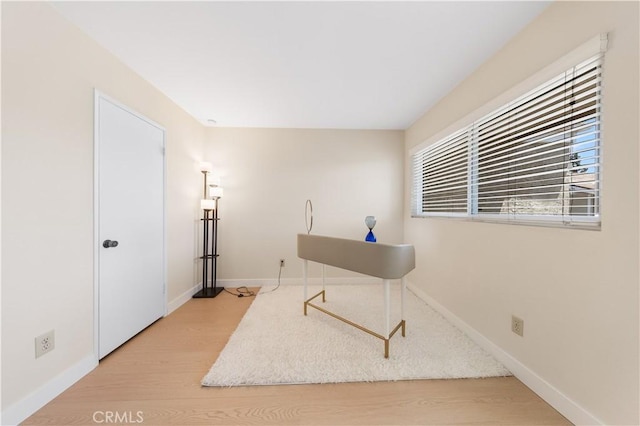 54 Kazan St Unit 27, Irvine, CA 92604 - home office with wood finished floors and baseboards