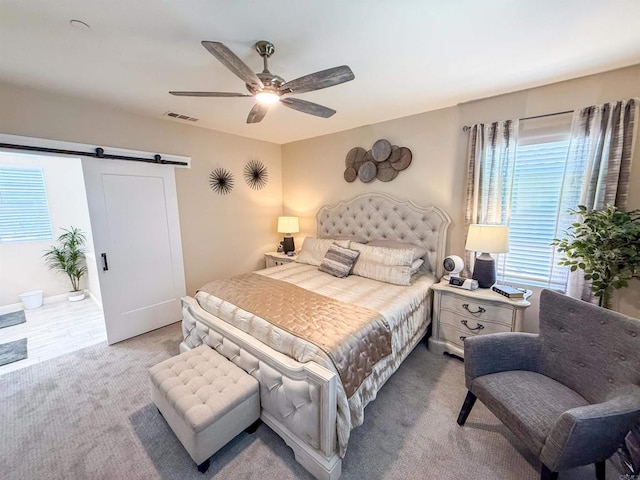 1410 Franceschi Dr, Chula Vista, CA 91913 - carpeted bedroom with a barn door and a ceiling fan