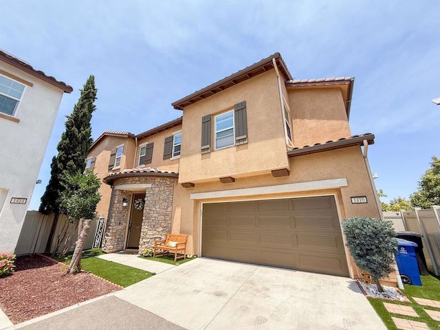 1410 Franceschi Dr, Chula Vista, CA 91913 - view of front of property featuring an attached garage, concrete driveway, stucco siding, stone siding, and a tile roof