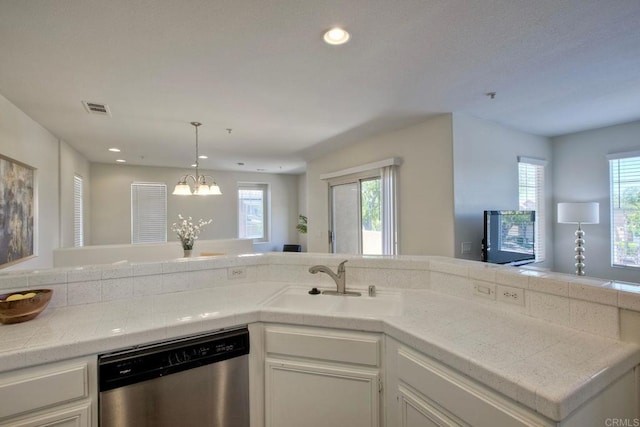 33657 Emerson Way Unit C, Temecula, CA 92592 - kitchen featuring stainless steel dishwasher, a chandelier, healthy amount of natural light, white cabinetry, and recessed lighting