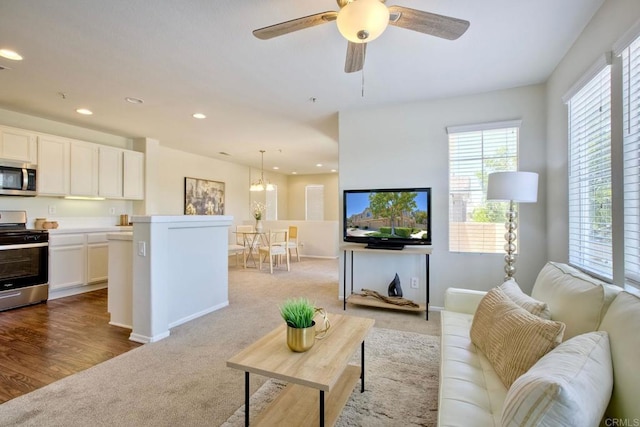 33657 Emerson Way Unit C, Temecula, CA 92592 - carpeted living room featuring plenty of natural light, recessed lighting, and ceiling fan