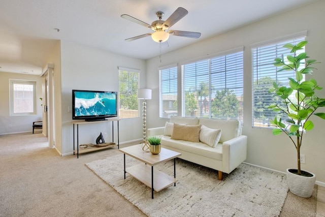 33657 Emerson Way Unit C, Temecula, CA 92592 - living room with healthy amount of natural light, ceiling fan, and carpet floors