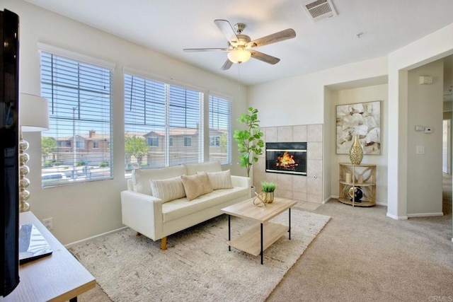 33657 Emerson Way Unit C, Temecula, CA 92592 - living area featuring a ceiling fan, carpet, and a fireplace