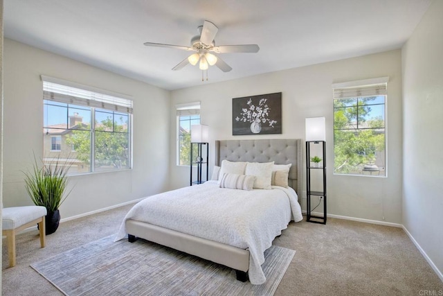 33657 Emerson Way Unit C, Temecula, CA 92592 - carpeted bedroom featuring multiple windows and a ceiling fan