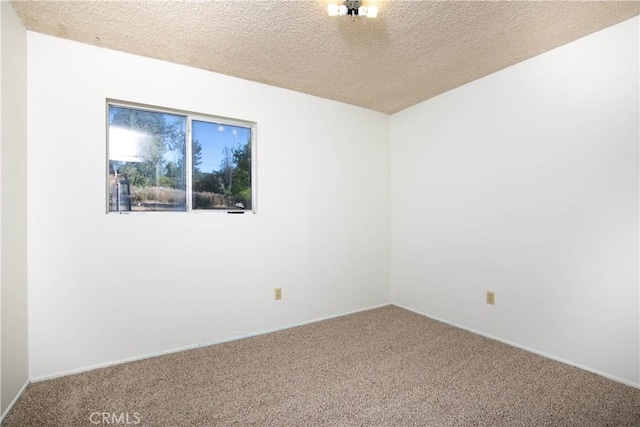 46404 Kings Canyon Rd, Lancaster, CA 93536 - empty room featuring carpet flooring and a textured ceiling