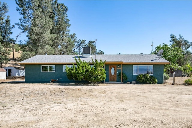 46404 Kings Canyon Rd, Lancaster, CA 93536 - view of front of property with a storage unit and stucco siding