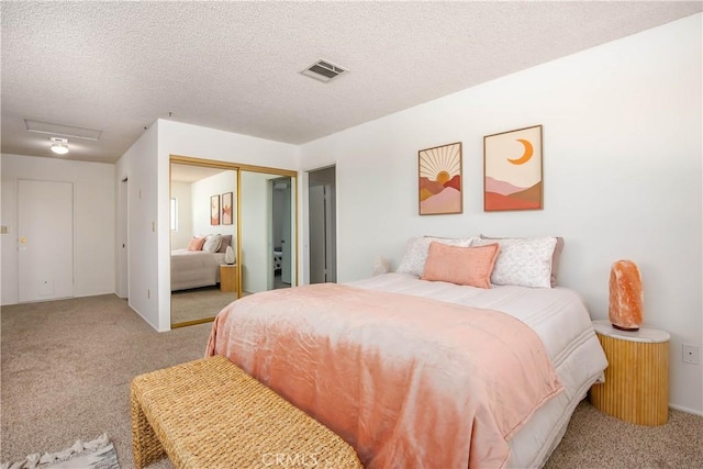 46404 Kings Canyon Rd, Lancaster, CA 93536 - carpeted bedroom featuring a closet, attic access, and a textured ceiling