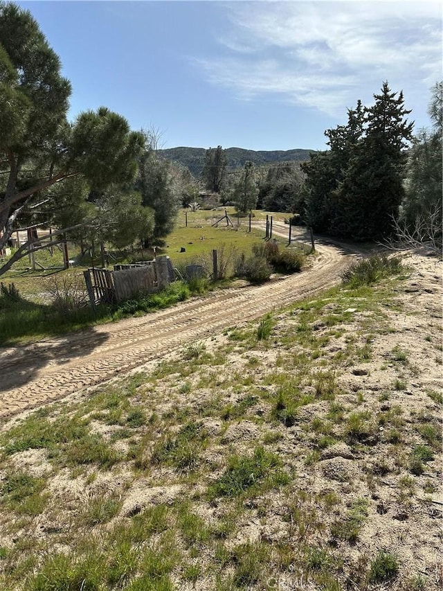 46404 Kings Canyon Rd, Lancaster, CA 93536 - view of yard featuring a rural view and a mountain view