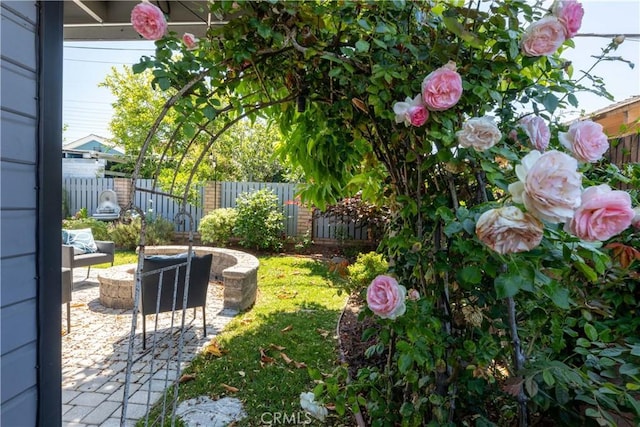 2054 Pattiz Ave, Long Beach, CA 90815 - fenced backyard with a patio and an outdoor fire pit