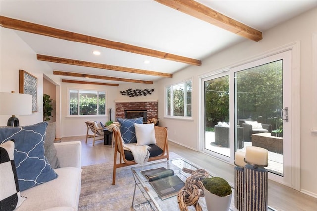 2054 Pattiz Ave, Long Beach, CA 90815 - living room featuring light wood-style flooring, beam ceiling, recessed lighting, and a brick fireplace