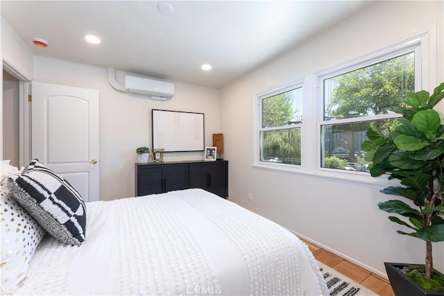 2054 Pattiz Ave, Long Beach, CA 90815 - bedroom featuring a wall mounted AC and light wood finished floors