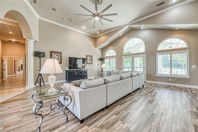 2457 Remington Ct, Merced, CA 95340 - living room with ornate columns, a ceiling fan, high vaulted ceiling, recessed lighting, and arched walkways